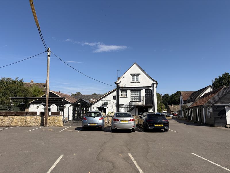 The car park beside The Woodman Inn, where the minibus collects